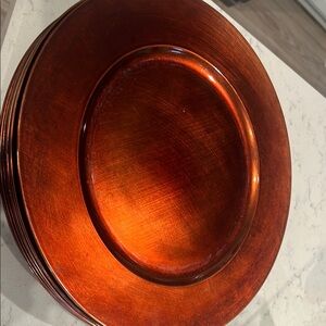 8 copper chargers to compliment any table setting